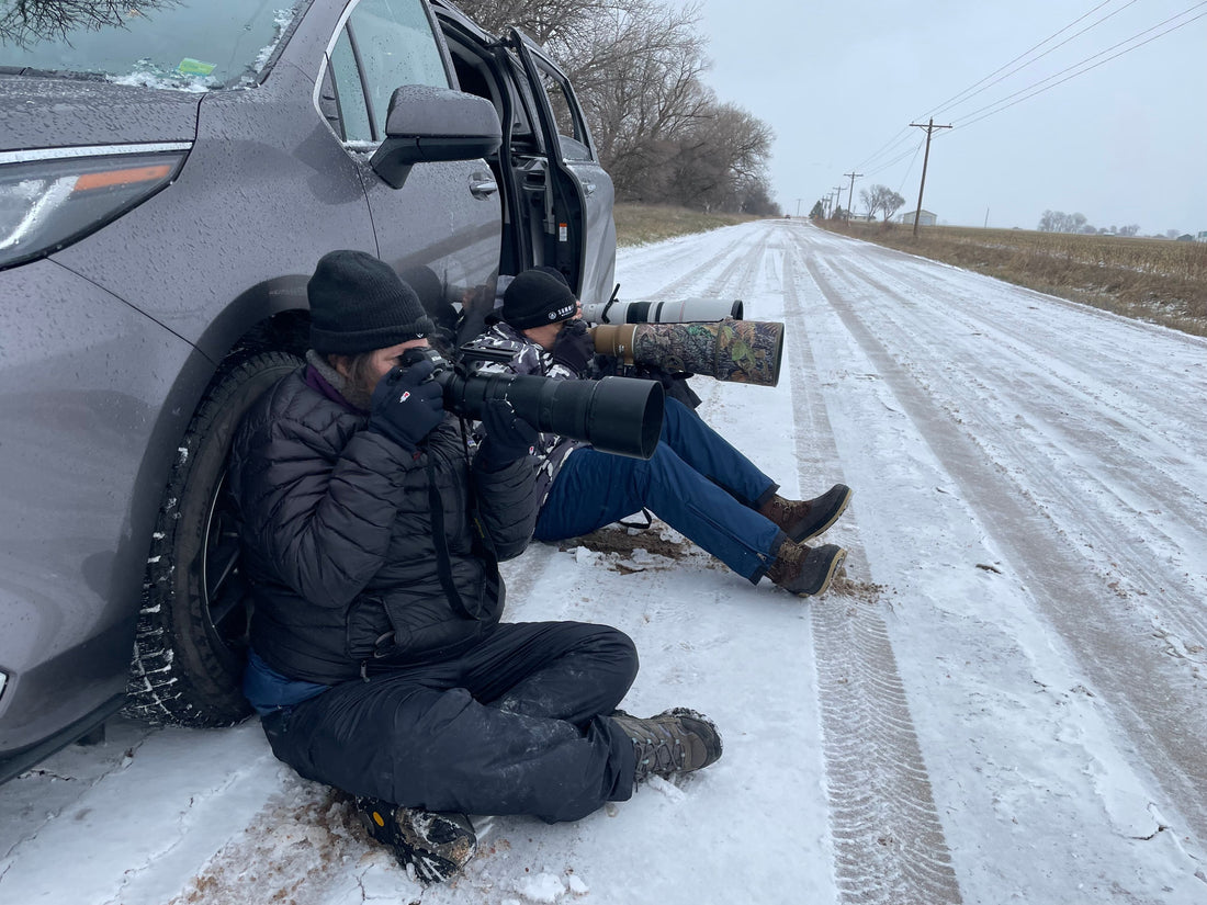 That’s me sitting on an icey road shooting during the blizzard